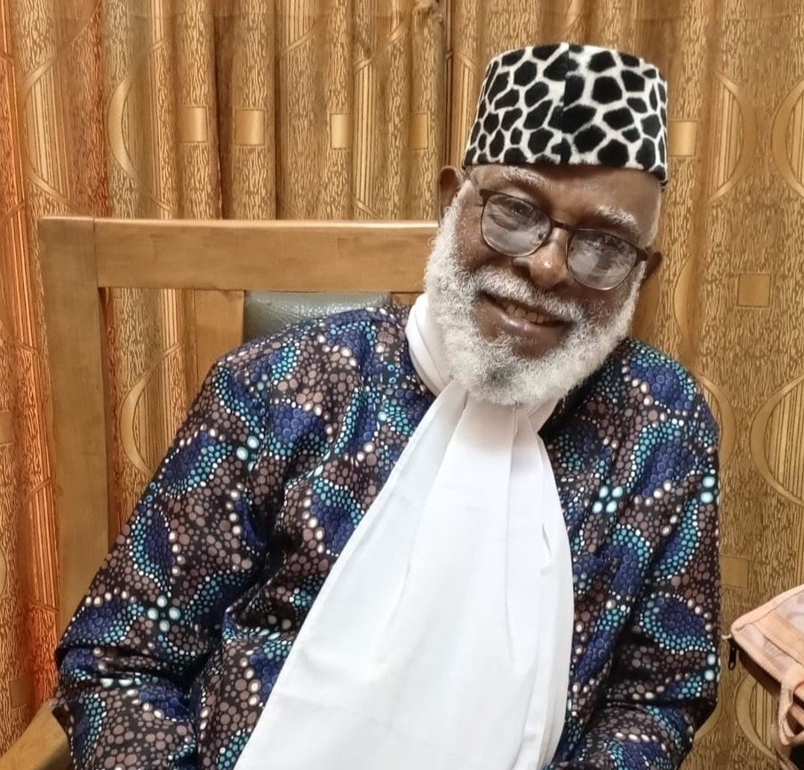 Uncle Ole smiling in traditional attire